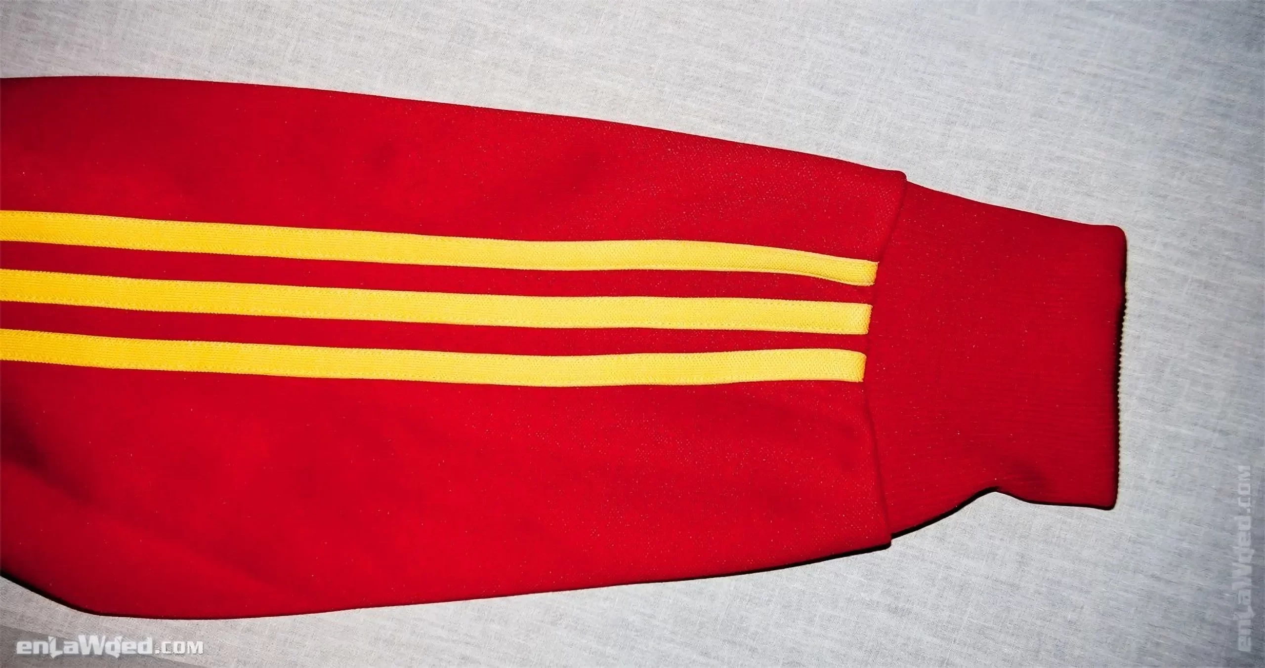 View on one the Ethiopian jacket's sleeves, in red with yellow 3-stripes